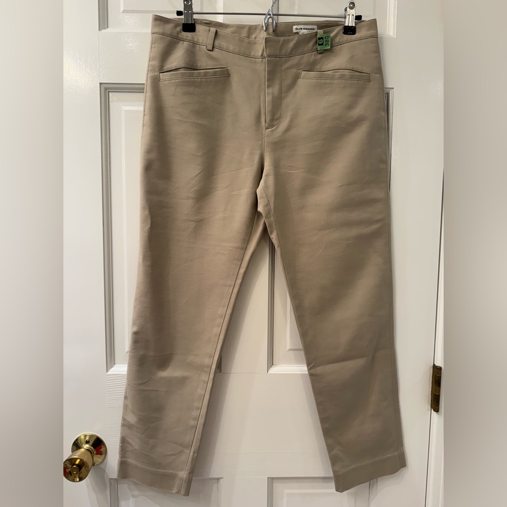 Club Monaco khaki ankle length pants.  Stretchy 
Four pockets. Double stitched